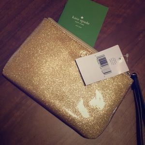 Brand new gold glitter Kate Spade wristlet!
